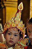 Ear piercing ceremony at Mahamuni Buddha Temple, Myanmar 